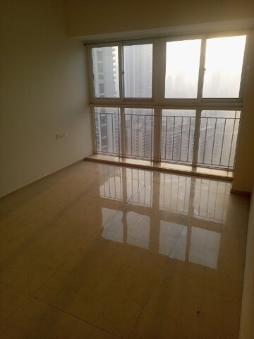 Room in 2 BHK Apartment at Ruparel Ariana, Parel – for Rent