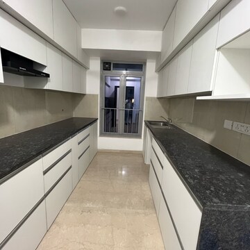 Kitchen in 3 BHK Apartment at Oberoi Sky City, Khande Rao Dongari – for Rent