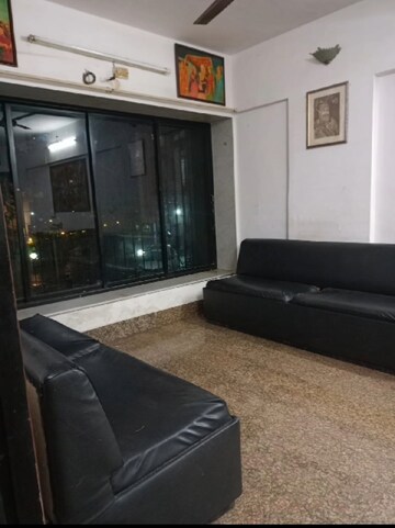 Living Room in 2 BHK Apartment at Ascot CHS, Andheri West – for Rent