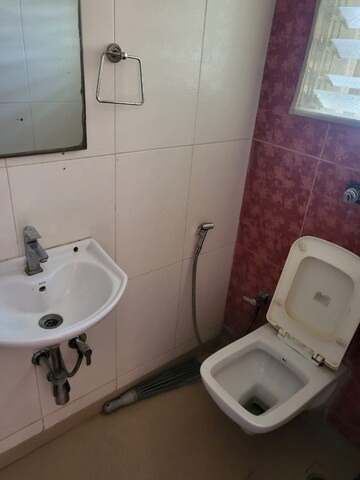 Bathroom in 1 BHK Apartment at Venkatesh Jyoti Breeze, Mira Road – for Rent