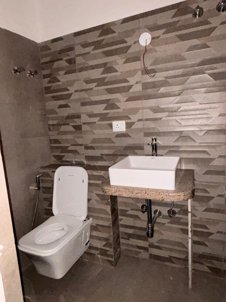 Bathroom, merlin-urvan 3 Bedroom 988 Sq.Ft. Apartment In Dum Dum Kolkata 8114374