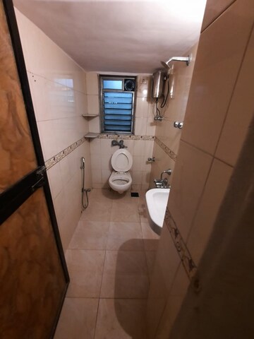 Bathroom in 2 BHK Apartment at Shree Vinayak Society, Vile Parle East – for Rent