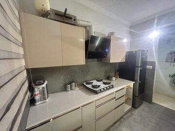 Kitchen in 3 BHK Builder Floor at Dhakoli Village – for Sale