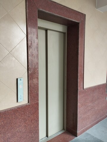 Building Lobby in 1 RK Apartment at Landmark Towers, Sector 51 – for Rent