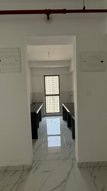 Kitchen in 2 BHK Apartment at Raymond Ten X Habitat, Swastik Garden – for Rent
