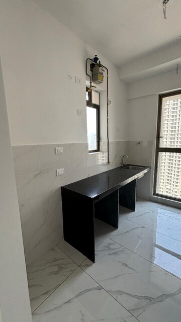 Kitchen in 2 BHK Apartment at Raymond Ten X Habitat, Swastik Garden – for Rent