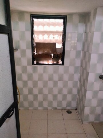 Bathroom in 1.5 BHK Apartment at Shree Chintamani Tower, Dhokali – for Rent