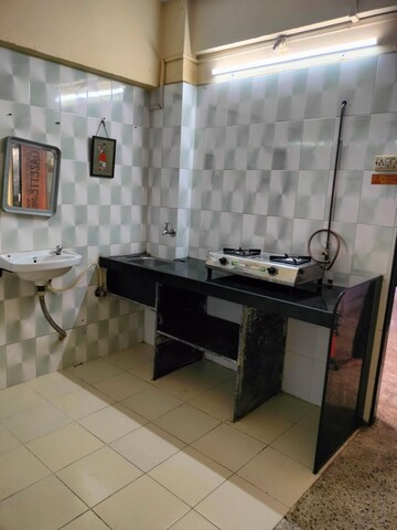 Kitchen in 1.5 BHK Apartment at Shree Chintamani Tower, Dhokali – for Rent