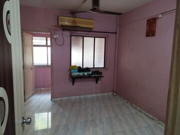 Living Room in 2 BHK Apartment at Ganesh Tower, Naupada – for Rent