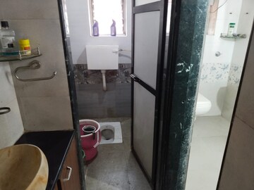 Bathroom in 2 BHK Apartment at Ganesh Tower, Naupada – for Rent