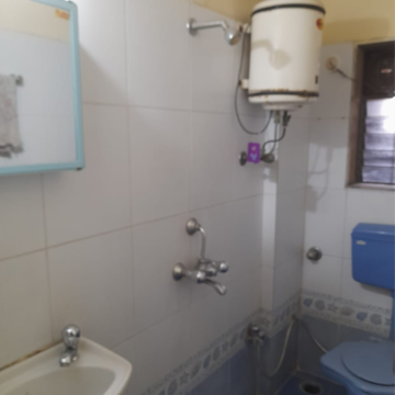 Bathroom in 2 BHK Apartment at Runwal Estate, Kolshet Road – for Rent