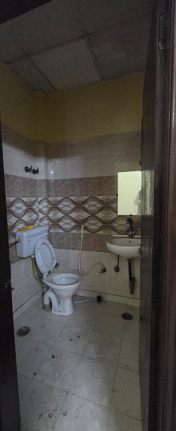 Bathroom in 3 BHK Builder Floor at Maya Homes, Indrapuram – for Rent