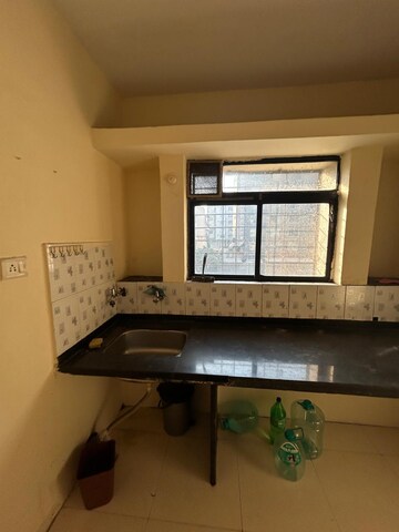 Kitchen in 1 BHK Apartment at Lalwani Residency, Viman Nagar – for Sale
