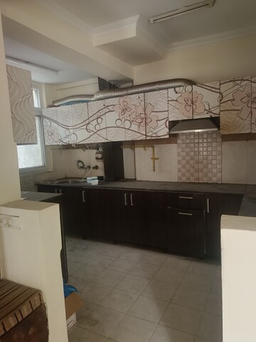 Kitchen in 3 BHK Apartment at Amrapali Silicon City, Sector 76 – for Rent