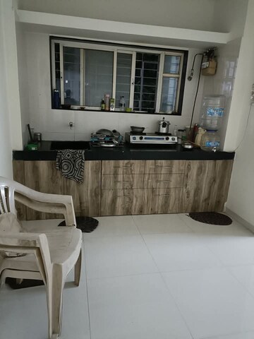 Kitchen in 2 BHK Apartment at Saudamini CHS, Kothrud – for Rent