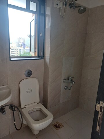 Bathroom in 1 BHK Apartment at Puranik City, Kasarvadavali – for Rent