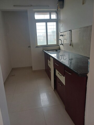 Kitchen in 1 BHK Apartment at Puranik City, Kasarvadavali – for Rent
