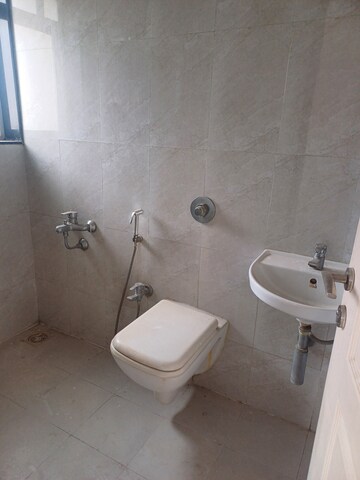 Bathroom in 1 BHK Apartment at Puranik City, Kasarvadavali – for Rent