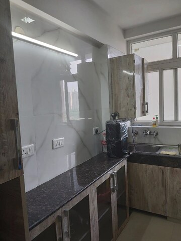 Kitchen in 3 BHK Apartment at ATS Homekraft Pious Hideaways, Sector 150 – for Rent