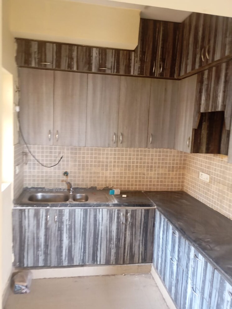 Kitchen, eldeco-live-by-the-greens 3 Bedroom 827 Sq.Ft. Apartment In Sector 150 Noida 8115478