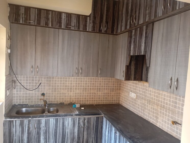 Kitchen, eldeco-live-by-the-greens 3 Bedroom 827 Sq.Ft. Apartment In Sector 150 Noida 8115478