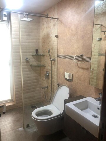 Bathroom in 4 BHK Apartment at Basant Garden – for Rent