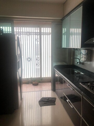 Kitchen in 4 BHK Apartment at Basant Garden – for Rent
