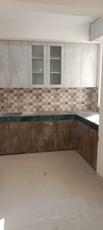 Kitchen in 2 BHK Apartment at Shree Vardhman Green Court, Sector 90 – for Rent