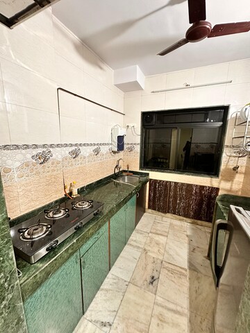 Kitchen in 2 BHK Apartment at NG Complex, Andheri East – for Rent