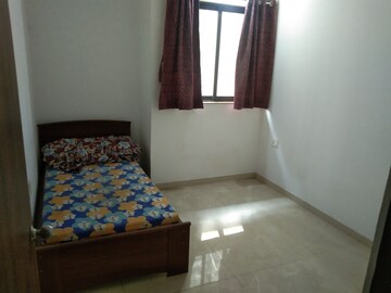 Bedroom in 2 BHK Apartment at Lodha Palava City, Dombivli East – for Sale