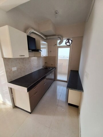 Kitchen in 2 BHK Apartment at Signature Global The Millennia, Sector 37d – for Rent