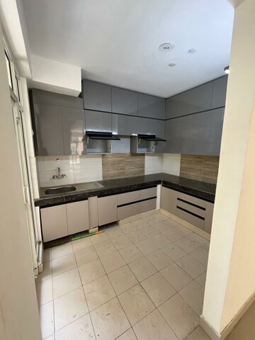 Kitchen in 2 BHK Apartment at Shree Vardhman Flora, Sector 90 – for Rent