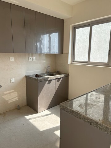 Kitchen in 2 BHK Apartment at Piramal Vaikunth, Balkum Pada – for Rent