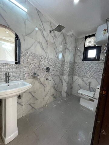 Bathroom in 2 BHK Builder Floor at Chattarpur – for Rent