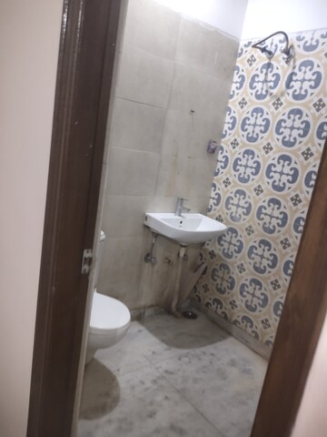 Bathroom in 3 BHK Builder Floor at Guru Nanak Enclave, Dhakoli Village – for Sale