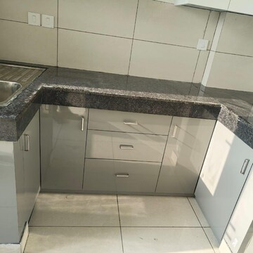 Kitchen in 2 BHK Apartment at Tata Value Homes, Sector 150 – for Rent