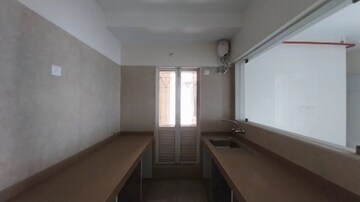Kitchen in 2 BHK Apartment at Dosti West County, Balkum Pada – for Rent