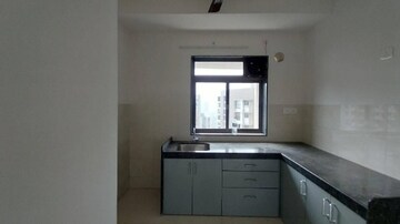 Kitchen in 2 BHK Apartment at Runwal Eirene, Balkum Pada – for Rent