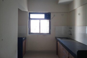 Kitchen in 2.5 BHK Apartment at Runwal Garden City, Balkum Pada – for Rent