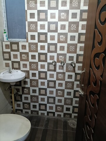 Bathroom in 3 BHK Builder Floor at Dhakoli Village – for Sale