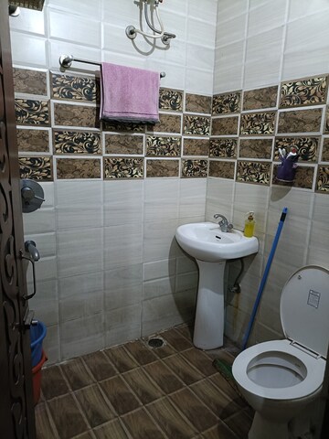 Bathroom in 3 BHK Builder Floor at Dhakoli Village – for Sale