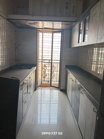 Kitchen in 2 BHK Apartment at Neminath Heights, Mira Road – for Sale