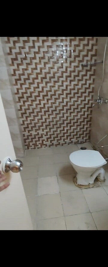 Bathroom in 2.5 BHK Apartment at Nilaya Greens, Raj Nagar Extension – for Sale