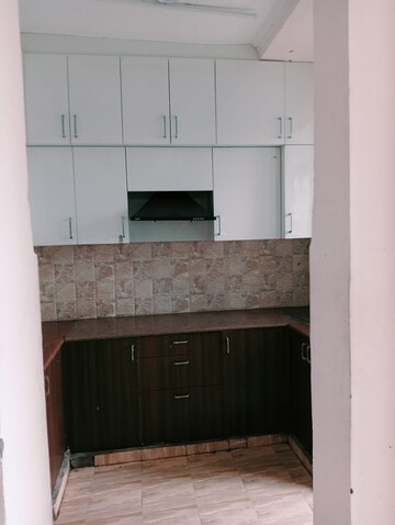 Kitchen in 2 BHK Apartment at Amrapali Golf Homes, Sector 4, Greater Noida – for Rent