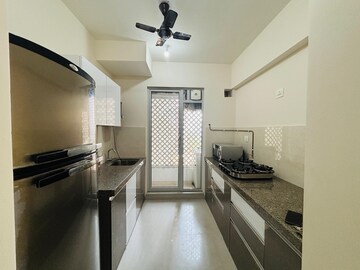 Kitchen in 2 BHK Apartment at Piramal Vaikunth, Balkum Pada – for Rent