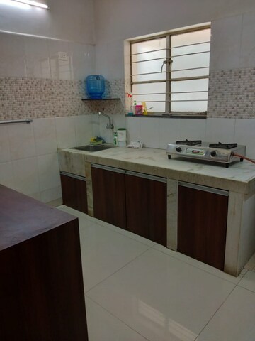 Kitchen in 2 BHK Apartment at Neptune Society, Kalyani Nagar – for Rent