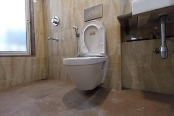 Bathroom in 1.5 BHK Apartment at Lodha Amara, Kolshet Road – for Rent