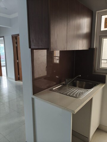 Kitchen in 3 BHK Apartment at Central Park Flower Valley Aqua Front Towers, Sohna Sector 33 – for Rent