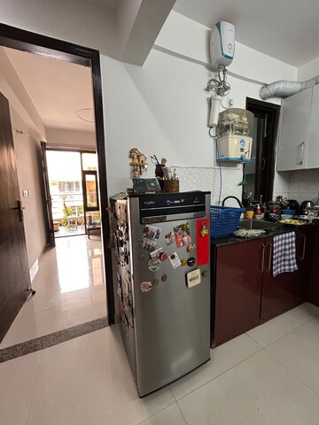 Kitchen in 3 BHK Apartment at Ansal API Esencia, Sector 67 – for Sale