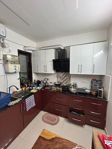 Kitchen in 3 BHK Apartment at Ansal API Esencia, Sector 67 – for Sale